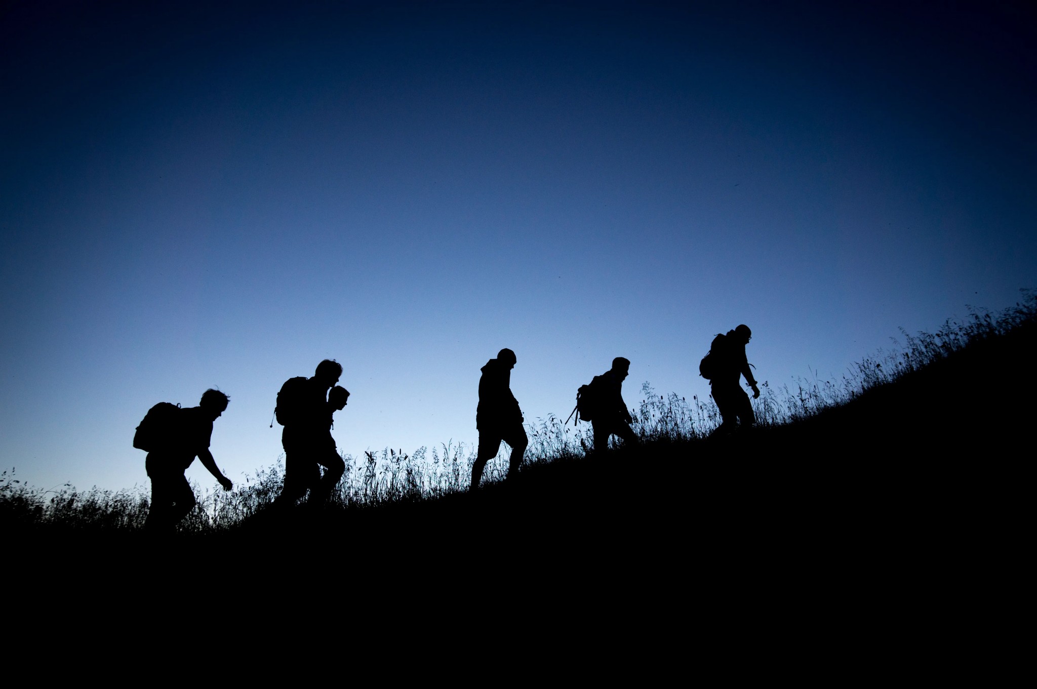 silhouette of people by Tobias Mrzyk on Unsplash